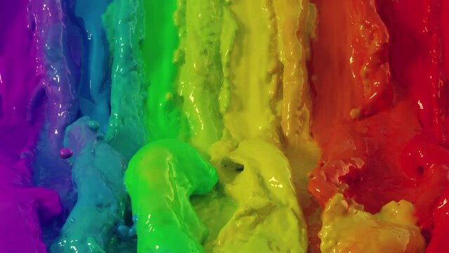 a rainbow colored waterfall. a rainbow colored liquid background. a multicolored painting waterfall