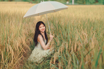 girl walking on rice fields