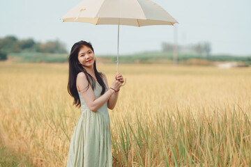 girl walking on rice fields