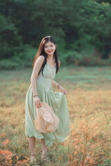 Fototapeta na wymiar girl walking on rice fields