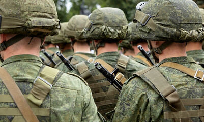 Army parade - a march of soldiers in uniform.