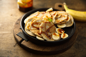 Homemade banana pancakes with caramel sauce