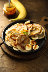 Homemade banana pancakes with caramel sauce
