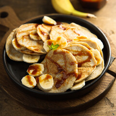 Homemade banana pancakes with caramel sauce