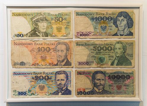10.20.2022 Warsaw, Poland. Museum of Life under Communism. Indoor shot of glass frame with six old Polish banknotes or bills. Pre-redenomination money. Thousand, five-thousands, ten-thousands