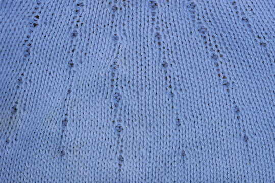 gray white fabric texture from a piece of crumpled clothing 