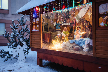 Christmas crib at a Cologne Christmas market. The scene where the Virgin Mary gave birth to Jesus...