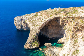 The Blue Grotto of Malta,  rock formation on the sea with crystal clear water