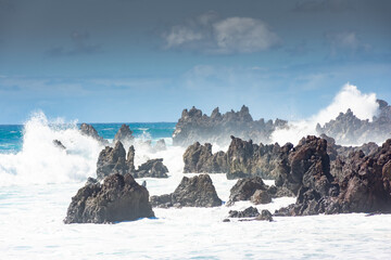 Powerful waves against the sea stacks of Lanzarote island, Atlantic Ocean, Canary Islands in Spain