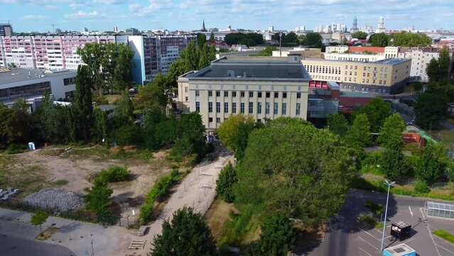 discotheque in residential area berlin at daytime. Dramatic aerial view flight germany