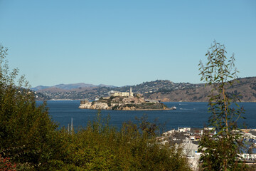 Fototapeta premium Panoramic scenic aerial view over San Francisco Bay Area with Golden Gate Bridge, downtown skyline cityscape and Alcatraz island sailing boats yachts harbor landmark sights Tower scenery