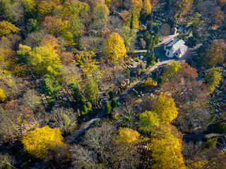 Kraków Aerial View. Rakowicki Cemetery at Autumn time. Kraków is a the capital of the Lesser Poland Voivodeship. Poland. Europe.  - obrazy, fototapety, plakaty