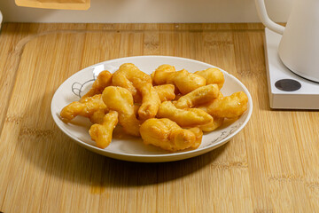 fried rice cake isolated on white plate 