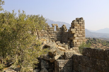 Fototapeta na wymiar Herakleia at Latmus (Latmos) view of Athena Temple. Bafa Lake, Milas, Turkey. Besparmak Mountains