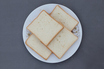 Bread On Plate Top View With Solid Background
