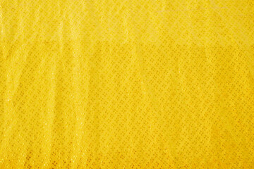 Yellow bed linen gradient texture blurred curve style of abstract luxury fabric,Wrinkled bed linen and gold shadows,background