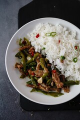 Asian style beef strips pepper stir fry, selective focus