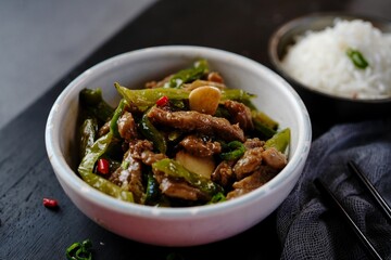 Asian style beef strips pepper stir fry, selective focus
