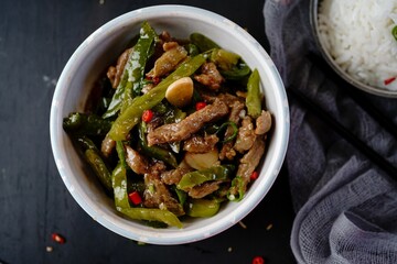 Asian style beef strips pepper stir fry, selective focus