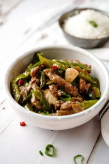 Asian style beef strips pepper stir fry, selective focus