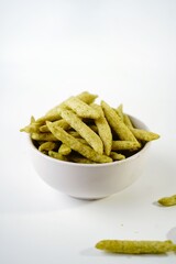 Green snap pea chips - healthy snacks, selective focus