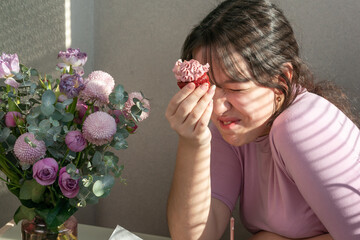Girl eating birthday cupcake