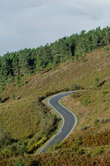 winding mountain road on a cloudy day