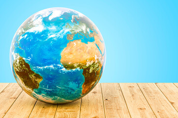 Earth Globe on the wooden table, 3D rendering