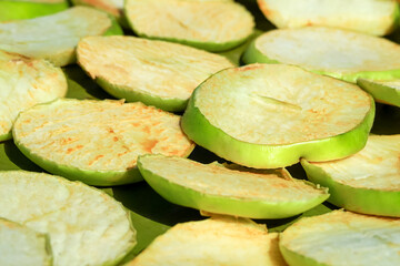 dried apple fruits production concept. drying apple slices