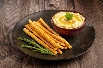 Homemade Grissini with Chickpea Hummus.