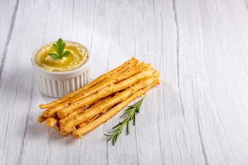 Homemade Grissini with Chickpea Hummus.