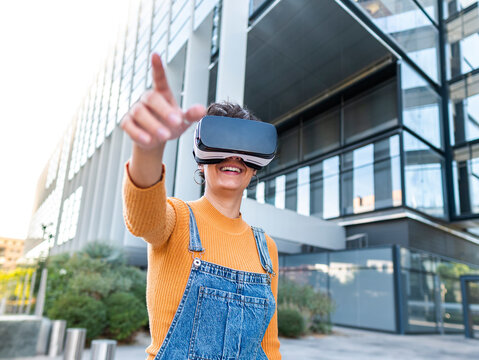 Excited female in VR headset