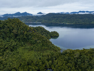 Fototapeta na wymiar Seascape in front of Kaprus Village, Location in Cendrawasih Bay National Park, West Papua Province