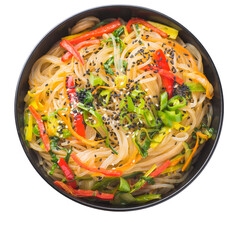Korean style instant noodle Japchae or Chapchae in black bowl isolated on white. Korean cuisine glass chapchae noodles dish with vegetables