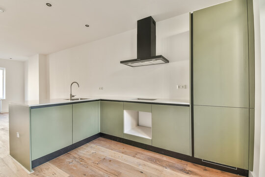 Empty kitchen with parquet floor