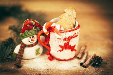 Christmas mug on wooden background. photo with copy space