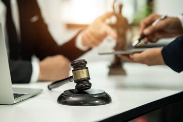 Judge gavel with Justice lawyers having team Concepts of Law and Legal services