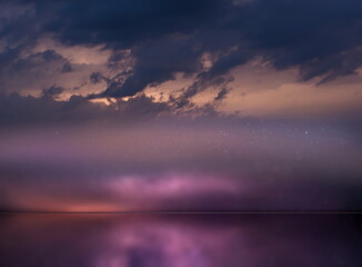   night  starry sky  and moon at sea lilac blue nebula cosmic milky way Aurora   seascape