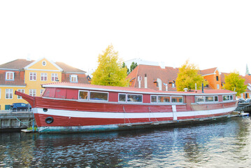 Red Houseboat on the River