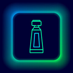 Glowing neon line Cream or lotion cosmetic tube icon isolated on black background. Body care products for men. Colorful outline concept. Vector