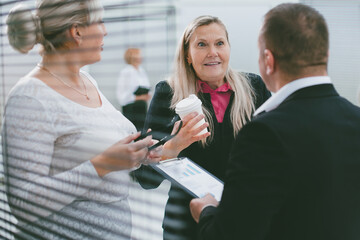 close up. group of employees discussing working issues