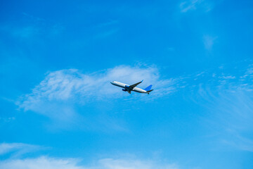 Fototapeta na wymiar Passenger plane in the clouds