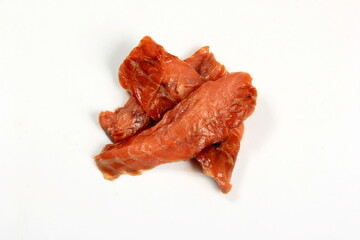Cold smoked salmon strips on a white background, smoked fish product