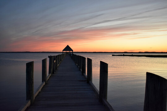 evening sunset image on the bay from a pier in Ocean City MD.