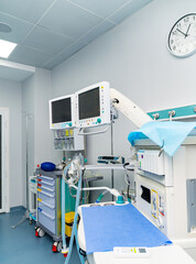 Modern hospital room with new technology equipment. Professional operating treatment.