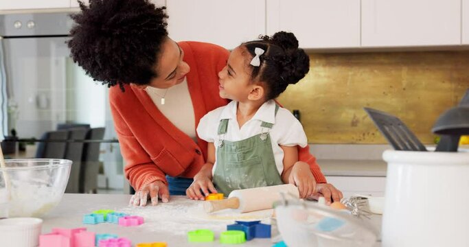 Mother, Girl Learning Baking In Kitchen And Rolling Flower Dough On Counter To Cook Cookies For Fun, Learning And Development. Happy Mom, Black Child With Smile And Teaching Daughter To Bake Together