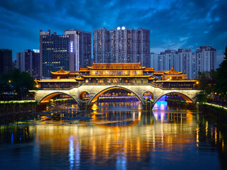 Famous landmark of Chengdue - Anshun bridge over Jin River illuminated at night, Chengdue, Sichuan , China