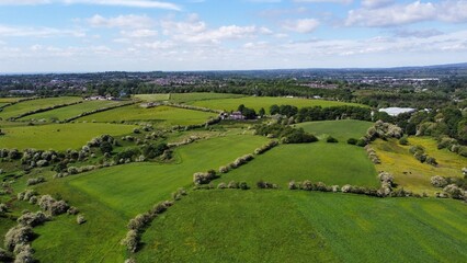 Fototapeta na wymiar Aerial view of green fields and open countryside. Taken in Lancashire England. 