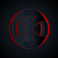 Paper cut Film reel icon isolated on black background. Paper art style. Vector