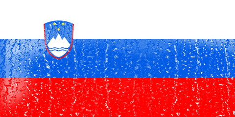 Naklejka premium 3D Flag of Slovenia on a glass with water drop background.